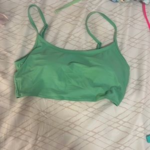Green athletic swim top.